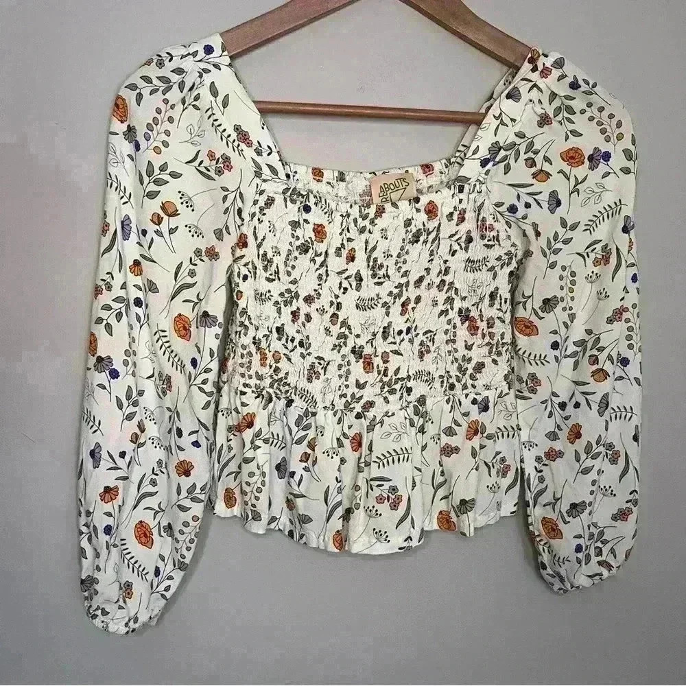 Thereabouts Girls Top. Size S (7/8) flowered pattern with ruffle bottom EUC